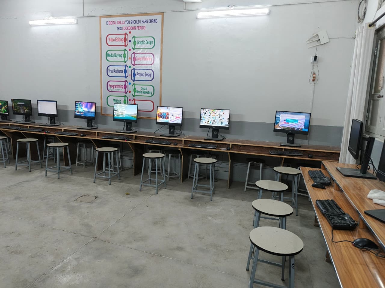 Computer lab workstations with multimedia teaching setup at LCST